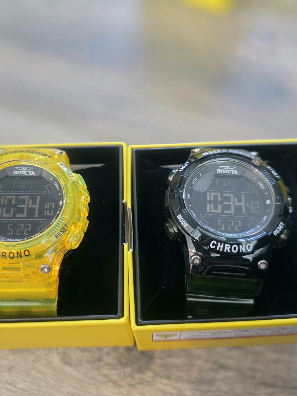 47. 48. Pair Of Invicta Digital Chrono Watches - Yellow and Green